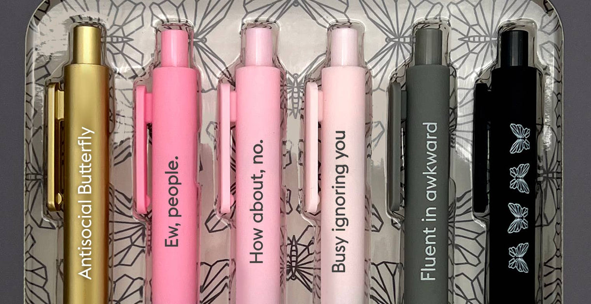 Close-up of funny introvert quote gel pens with witty sayings