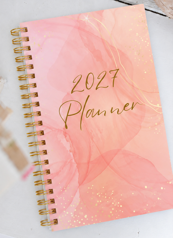 A4 Peach 2027 teacher planner with a peach-toned cover, gold details, and flat-lay coil binding