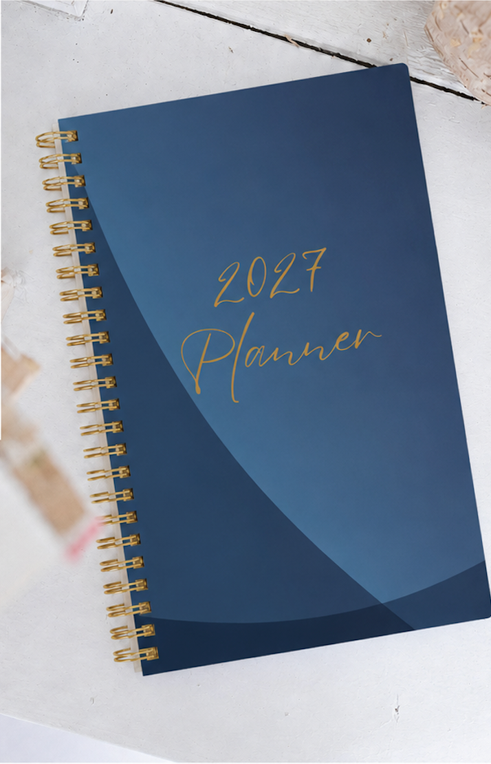 2027 Navy Teacher Planner closed showing navy blue cover design by Dayna Tinline Designs
